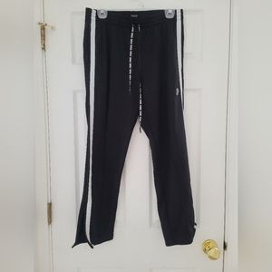 Black petite track pants with zipper at the bottom of pants Size M